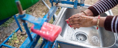 WASH SDG woman washing hands